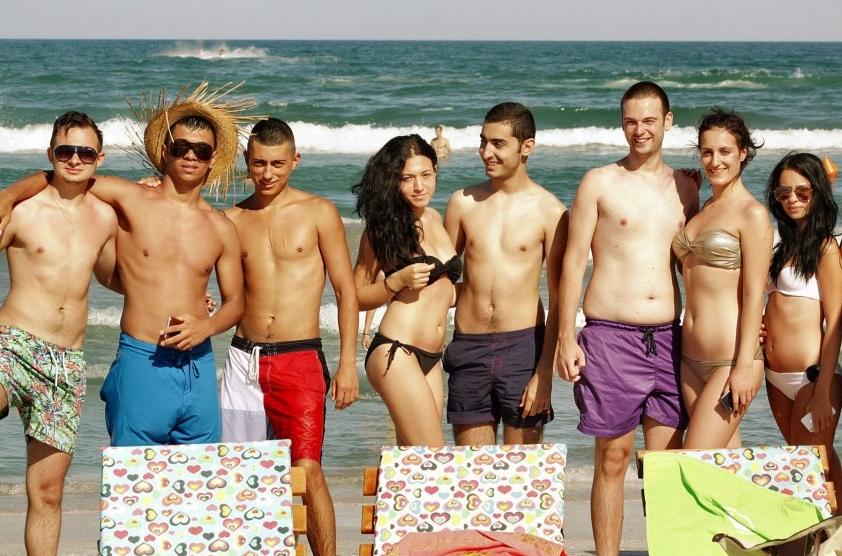Stag group partying on the beach